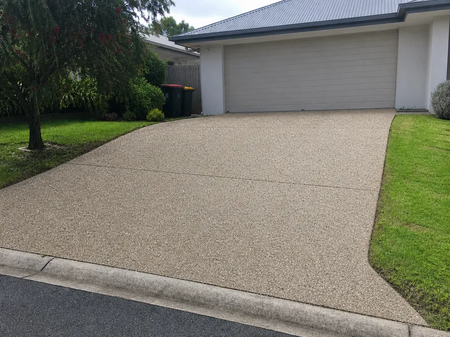 Exposed-aggregate driveway at a Brisbane home after pressure cleaning