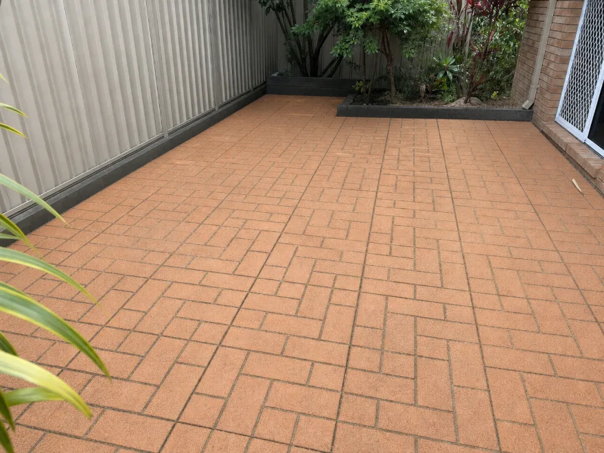 Hard surface after high-pressure cleaning, grime removed